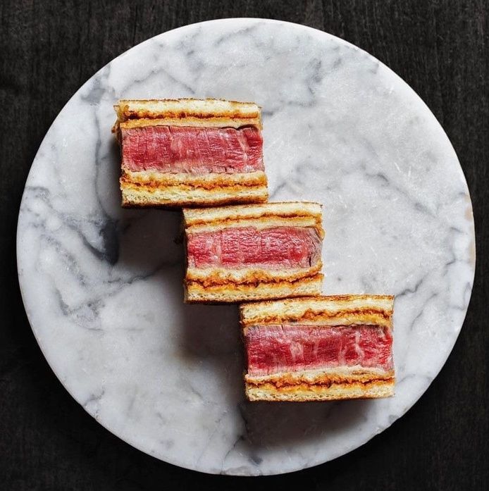 Wagyu sandos on a marble plate